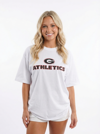 UGA Bulldogs women’s Athletics Heavyweight Tee by Arena Graffiti, showing a gray T-shirt with Bulldogs team logo and athletic design.