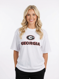 UGA Bulldogs women’s Georgia Mark Heavyweight T-shirt by Arena Graffiti, featuring team logo and bold graphic on white fabric